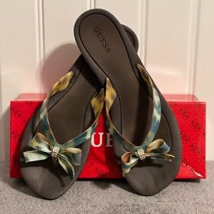 Guess flip-flops with bow and rhinestones!